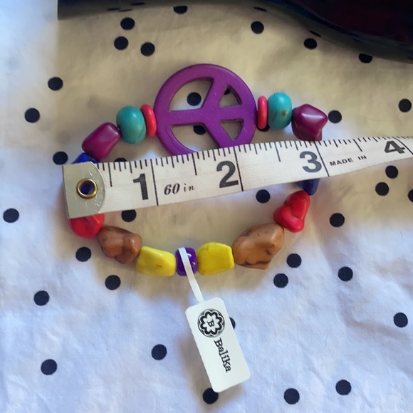 Handcrafted beaded bracelet. Multi color with ☮️ sign purple bead - Picture 4 of 7